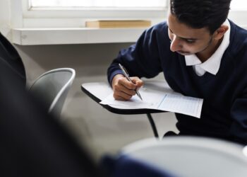 Young muslim student in class