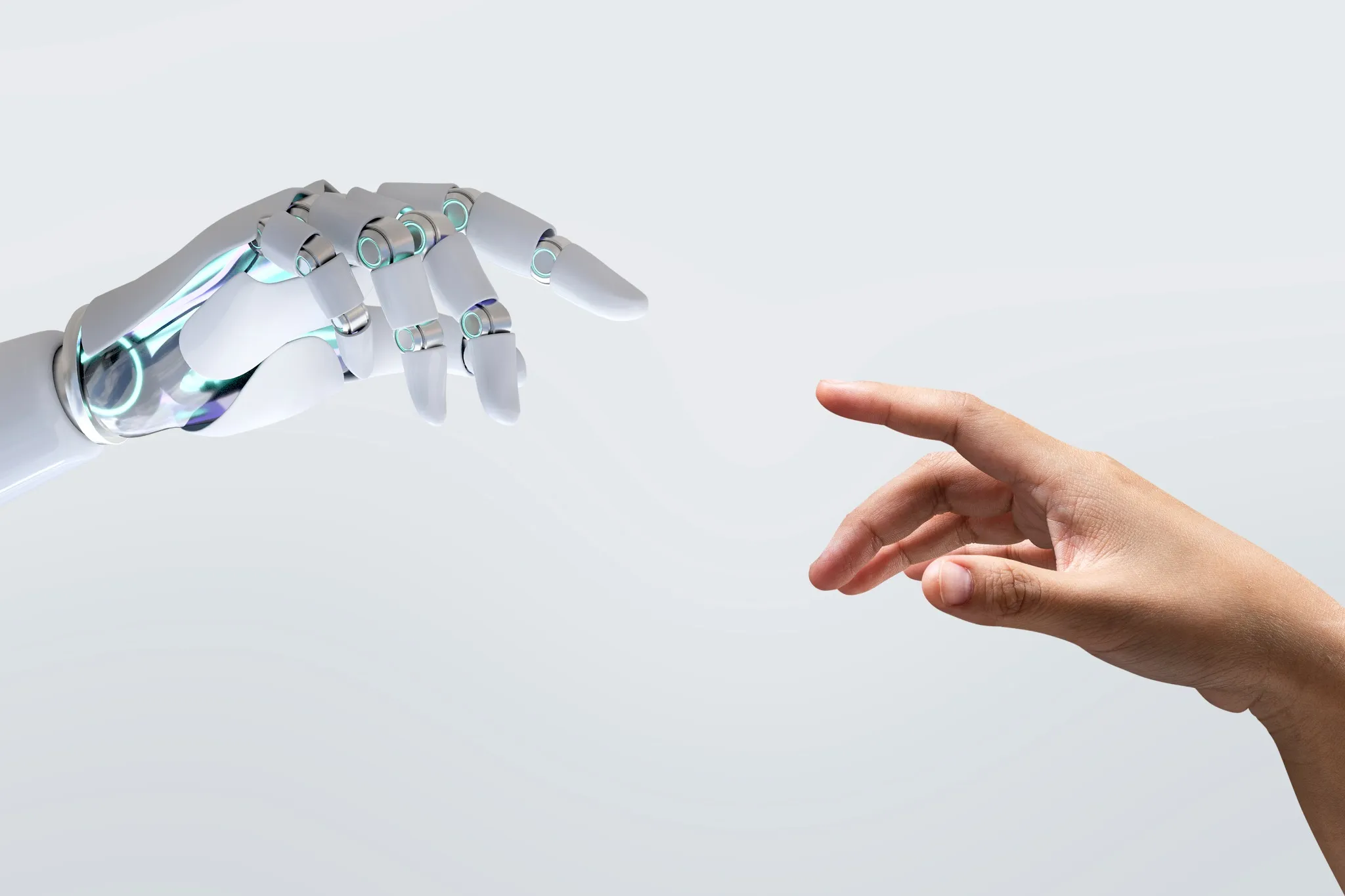 Imagem mostrando a interação entre um braço humano e um braço robótico, ilustrando a profissão de especialista em inteligência artificial e aprendizado de máquina.