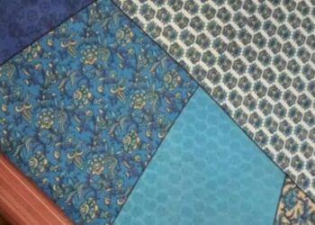 Desafio visual com imagem de vários tecidos estampados coloridos com um anel camuflado entre eles