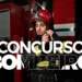Bombeiro vestindo uniforme ao lado de caminhão de incêndio com texto “CONCURSO BOMBEIRO”.