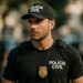 Agente da Polícia Civil uniformizado com boné e distintivo — concurso Polícia Civil Tocantins 450 vagas 2026